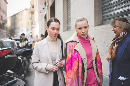 MILAN, ITALY - FEBRUARY 27: People during Milan Fashion week, Italy on February, 27 2015. Eccentric and fashionable people outside city during Milan fashion week wait for models and famous peopleのeditorial素材