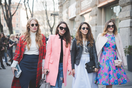 MILAN, ITALY - FEBRUARY 28: People during Milan Fashion week, Italy on February, 28 2015. Eccentric and fashionable people outside city during Milan fashion week wait for models and famous peopleのeditorial素材