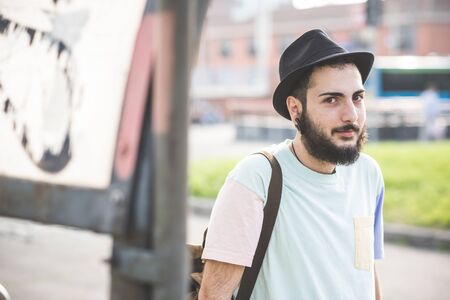 young handsome hipster modern man in townの写真素材