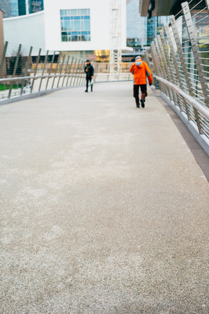 blurred city and people urban scene backgroundの写真素材