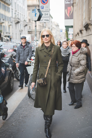 MILAN, ITALY - MARCH 01: People during Milan Fashion week, Italy on March, 01 2015. Eccentric and fashionable people outside city during Milan fashion week wait for models and famous peopleのeditorial素材