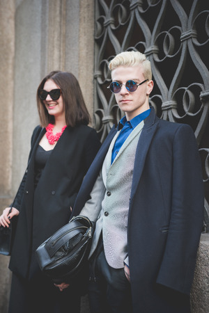 MILAN, ITALY - MARCH 01: People during Milan Fashion week, Italy on March, 01 2015. Eccentric and fashionable people outside city during Milan fashion week wait for models and famous peopleのeditorial素材