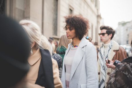 MILAN, ITALY - MARCH 01: People during Milan Fashion week, Italy on March, 01 2015. Eccentric and fashionable people outside city during Milan fashion week wait for models and famous peopleのeditorial素材