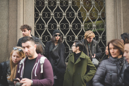MILAN, ITALY - MARCH 01: People during Milan Fashion week, Italy on March, 01 2015. Eccentric and fashionable people outside city during Milan fashion week wait for models and famous peopleのeditorial素材