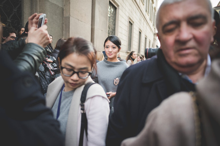 MILAN, ITALY - MARCH 01: People during Milan Fashion week, Italy on March, 01 2015. Eccentric and fashionable people outside city during Milan fashion week wait for models and famous peopleのeditorial素材