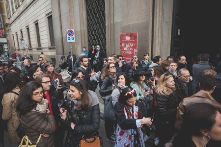 MILAN, ITALY - MARCH 01: People during Milan Fashion week, Italy on March, 01 2015. Eccentric and fashionable people outside city during Milan fashion week wait for models and famous peopleのeditorial素材