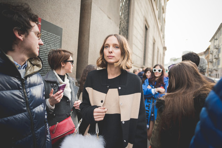 MILAN, ITALY - MARCH 01: People during Milan Fashion week, Italy on March, 01 2015. Eccentric and fashionable people outside city during Milan fashion week wait for models and famous peopleのeditorial素材