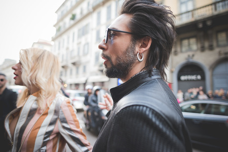 MILAN, ITALY - MARCH 01: People during Milan Fashion week, Italy on March, 01 2015. Eccentric and fashionable people outside city during Milan fashion week wait for models and famous peopleのeditorial素材