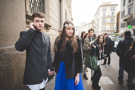 MILAN, ITALY - MARCH 01: People during Milan Fashion week, Italy on March, 01 2015. Eccentric and fashionable people outside city during Milan fashion week wait for models and famous peopleのeditorial素材