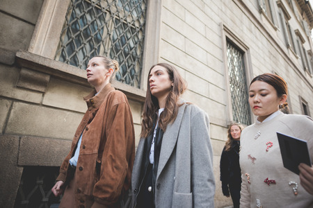 MILAN, ITALY - MARCH 01: People during Milan Fashion week, Italy on March, 01 2015. Eccentric and fashionable people outside city during Milan fashion week wait for models and famous peopleのeditorial素材