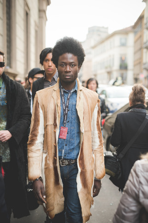 MILAN, ITALY - MARCH 01: People during Milan Fashion week, Italy on March, 01 2015. Eccentric and fashionable people outside city during Milan fashion week wait for models and famous peopleのeditorial素材