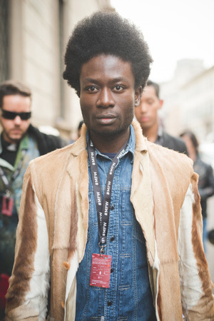 MILAN, ITALY - MARCH 01: People during Milan Fashion week, Italy on March, 01 2015. Eccentric and fashionable people outside city during Milan fashion week wait for models and famous peopleのeditorial素材