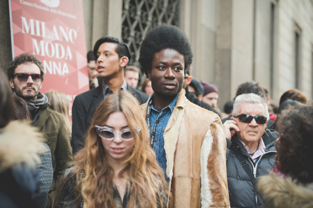 MILAN, ITALY - MARCH 01: People during Milan Fashion week, Italy on March, 01 2015. Eccentric and fashionable people outside city during Milan fashion week wait for models and famous peopleのeditorial素材