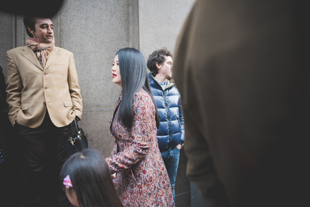 MILAN, ITALY - MARCH 01: People during Milan Fashion week, Italy on March, 01 2015. Eccentric and fashionable people outside city during Milan fashion week wait for models and famous peopleのeditorial素材