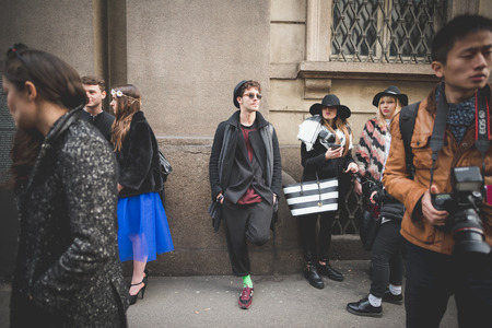 MILAN, ITALY - MARCH 01: People during Milan Fashion week, Italy on March, 01 2015. Eccentric and fashionable people outside city during Milan fashion week wait for models and famous peopleのeditorial素材