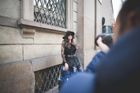 MILAN, ITALY - MARCH 01: People during Milan Fashion week, Italy on March, 01 2015. Eccentric and fashionable people outside city during Milan fashion week wait for models and famous peopleのeditorial素材