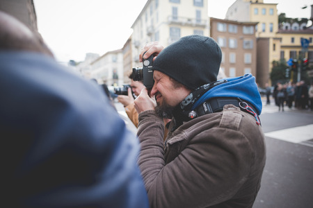 MILAN, ITALY - MARCH 01: People during Milan Fashion week, Italy on March, 01 2015. Eccentric and fashionable people outside city during Milan fashion week wait for models and famous peopleのeditorial素材