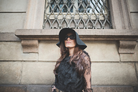 MILAN, ITALY - MARCH 01: People during Milan Fashion week, Italy on March, 01 2015. Eccentric and fashionable people outside city during Milan fashion week wait for models and famous peopleのeditorial素材