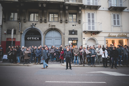 MILAN, ITALY - MARCH 01: People during Milan Fashion week, Italy on March, 01 2015. Eccentric and fashionable people outside city during Milan fashion week wait for models and famous peopleのeditorial素材