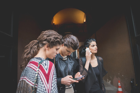 MILAN, ITALY - MARCH 01: People during Milan Fashion week, Italy on March, 01 2015. Eccentric and fashionable people outside city during Milan fashion week wait for models and famous peopleのeditorial素材