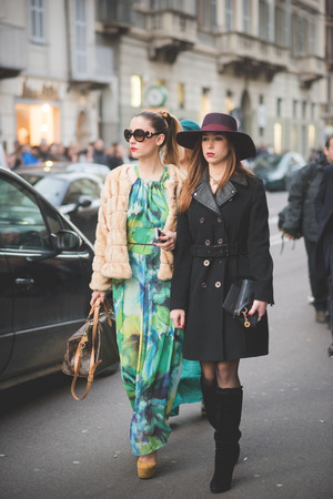 MILAN, ITALY - MARCH 01: People during Milan Fashion week, Italy on March, 01 2015. Eccentric and fashionable people outside city during Milan fashion week wait for models and famous peopleのeditorial素材