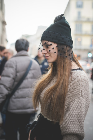 MILAN, ITALY - MARCH 01: People during Milan Fashion week, Italy on March, 01 2015. Eccentric and fashionable people outside city during Milan fashion week wait for models and famous peopleのeditorial素材