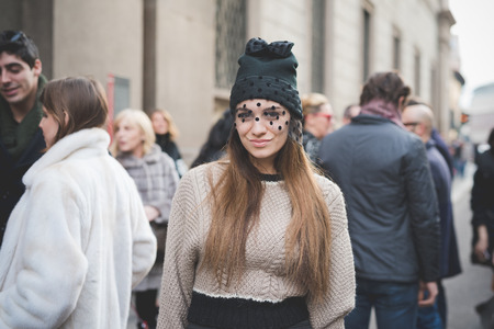MILAN, ITALY - MARCH 01: People during Milan Fashion week, Italy on March, 01 2015. Eccentric and fashionable people outside city during Milan fashion week wait for models and famous peopleのeditorial素材
