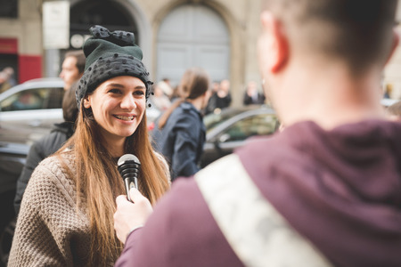 MILAN, ITALY - MARCH 01: People during Milan Fashion week, Italy on March, 01 2015. Eccentric and fashionable people outside city during Milan fashion week wait for models and famous peopleのeditorial素材