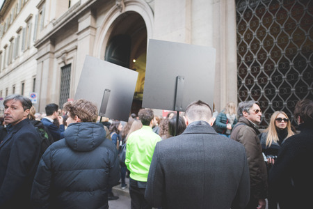 MILAN, ITALY - MARCH 01: People during Milan Fashion week, Italy on March, 01 2015. Eccentric and fashionable people outside city during Milan fashion week wait for models and famous peopleのeditorial素材