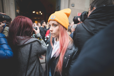 MILAN, ITALY - MARCH 01: People during Milan Fashion week, Italy on March, 01 2015. Eccentric and fashionable people outside city during Milan fashion week wait for models and famous peopleのeditorial素材