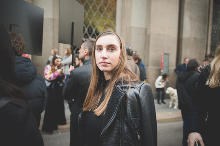 MILAN, ITALY - MARCH 01: People during Milan Fashion week, Italy on March, 01 2015. Eccentric and fashionable people outside city during Milan fashion week wait for models and famous peopleのeditorial素材