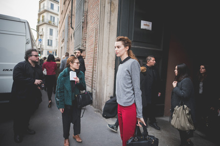 MILAN, ITALY - MARCH 01: People during Milan Fashion week, Italy on March, 01 2015. Eccentric and fashionable people outside city during Milan fashion week wait for models and famous peopleのeditorial素材