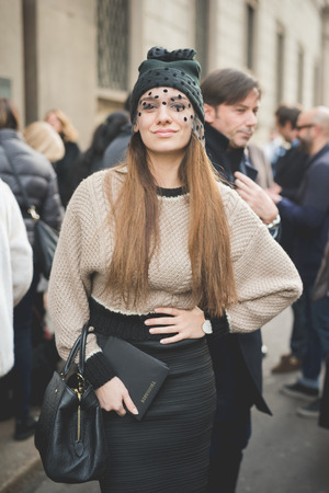 MILAN, ITALY - MARCH 01: People during Milan Fashion week, Italy on March, 01 2015. Eccentric and fashionable people outside city during Milan fashion week wait for models and famous peopleのeditorial素材