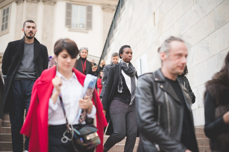 MILAN, ITALY - FEBRUARY 28: People during Milan Fashion week, Italy on February, 28 2015. Eccentric and fashionable people outside city during Milan fashion week wait for models and famous peopleのeditorial素材