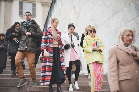 MILAN, ITALY - FEBRUARY 28: People during Milan Fashion week, Italy on February, 28 2015. Eccentric and fashionable people outside city during Milan fashion week wait for models and famous peopleのeditorial素材