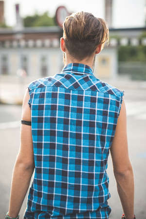 young handsome bearded hipster man in the cityの写真素材