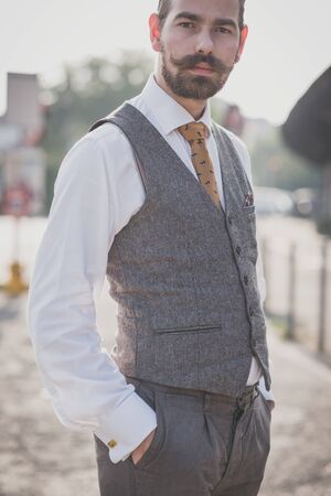 handsome big moustache hipster man in the cityの写真素材