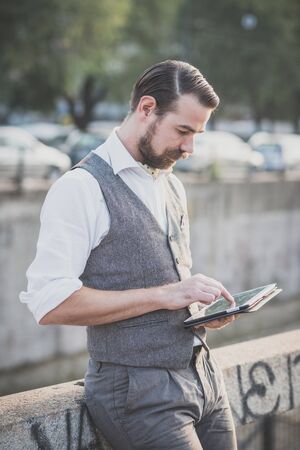 handsome big moustache hipster man in the cityの写真素材