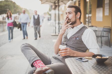 handsome big moustache hipster man in the cityの写真素材