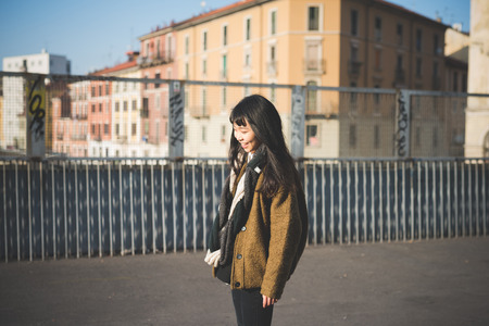 young beautiful asian hipster woman in the cityの写真素材