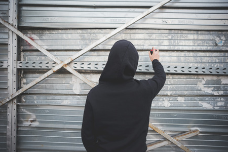 young asian hip hop man in town outdoor lifestyleの写真素材