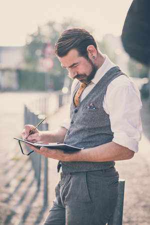 handsome big moustache hipster man in the cityの写真素材