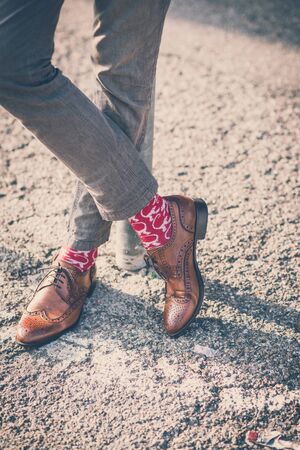 close up legs of handsome big moustache hipster man in the cityの写真素材