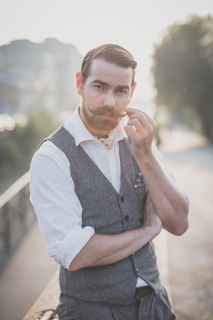 handsome big moustache hipster man in the cityの写真素材