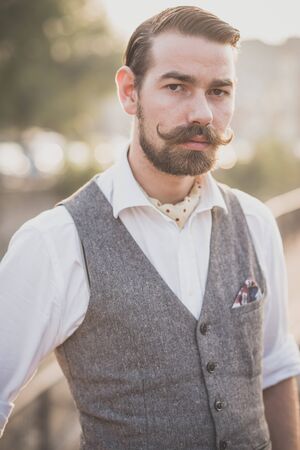 handsome big moustache hipster man in the cityの写真素材