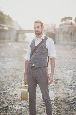 handsome big moustache hipster man in the cityの写真素材