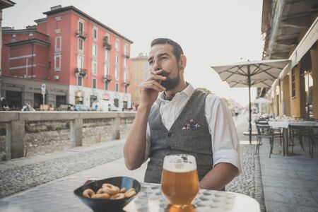 handsome big moustache hipster man in the cityの写真素材