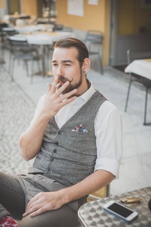 handsome big moustache hipster man in the cityの写真素材