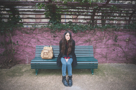 young beautiful long hair model woman living the city in winter outdoor cityの写真素材