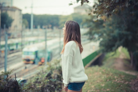 young beautiful woman girl autumn outdoorの写真素材